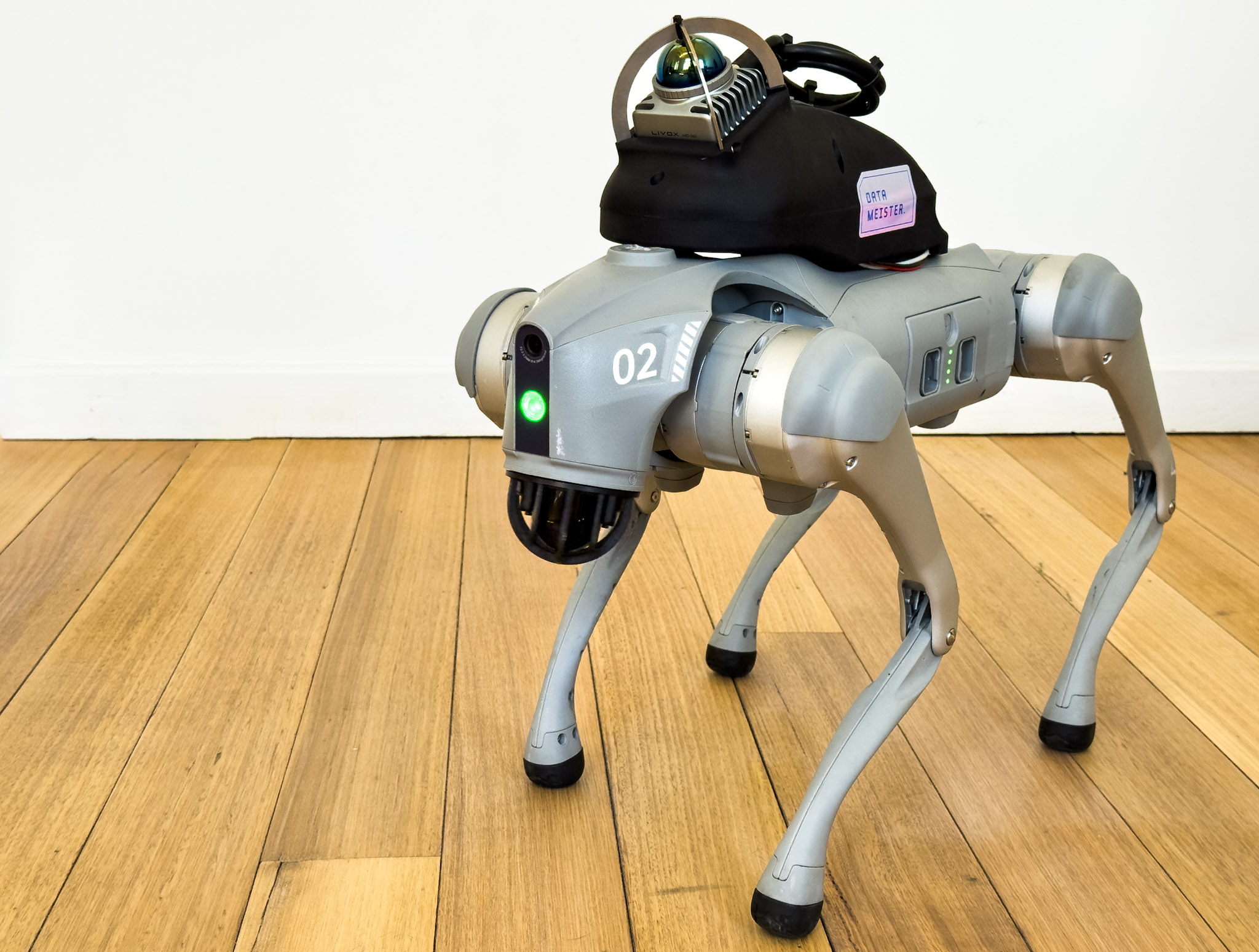The full hardware stack: Unitree GO2 with NVIDIA Jetson and Livox MID-360 mounted on the robot's back